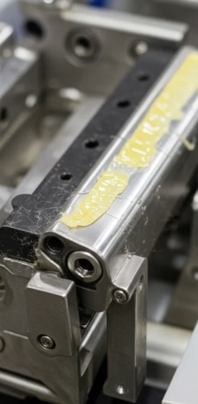 Production tooling with resin buildup before cleaning